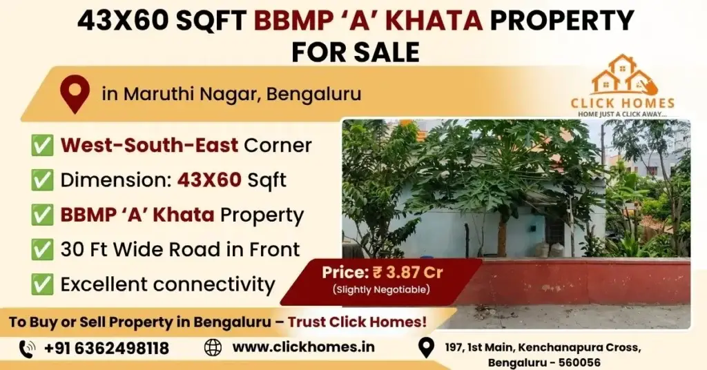 43X60 Site for Sale in Maruthi Nagar: A premium 43x60 sqft corner residential plot with a low-rise structure and green trees for sale in Maruthi Nagar, Bengaluru. The property features a West-South-East corner orientation, clear BBMP 'A' Khata documentation, and stands on a 30ft wide front road, listed by Click Homes.